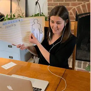 kelly conducting a Telehealth class